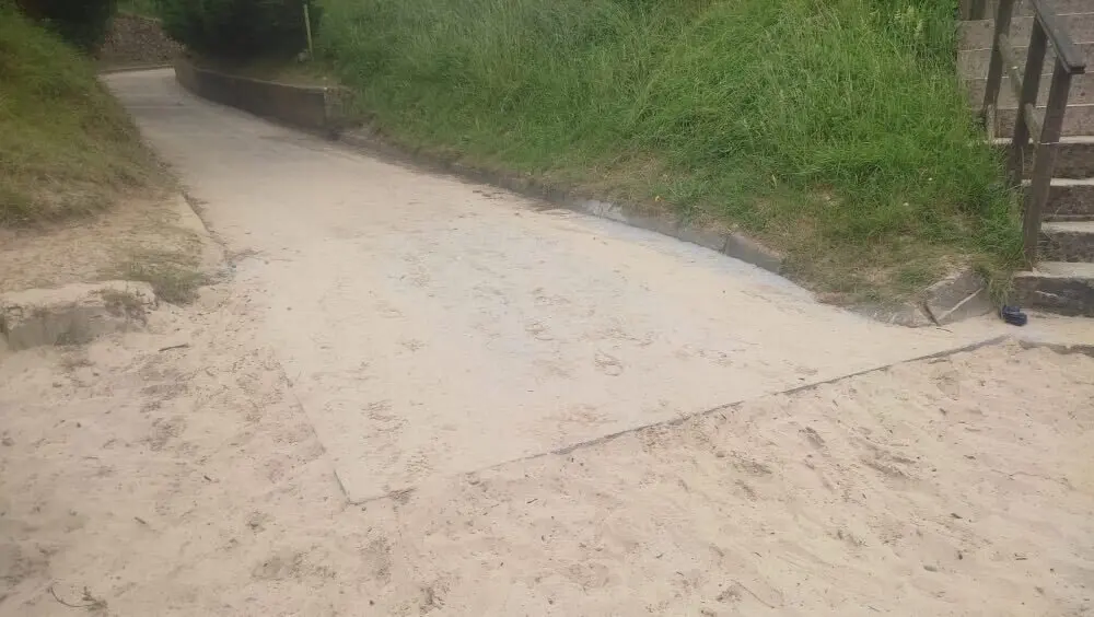 losa-acceso-playa-poo