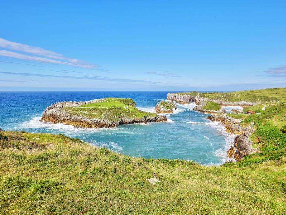 Playa de Cué.
Juan de Tury
